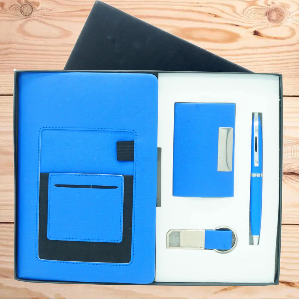 Gift Set Combo 4 in 1 6 Gift Set Combo 4 in 1 Blue color with logo engraved on all Dairy, pen, Keychain, and Card Holder
