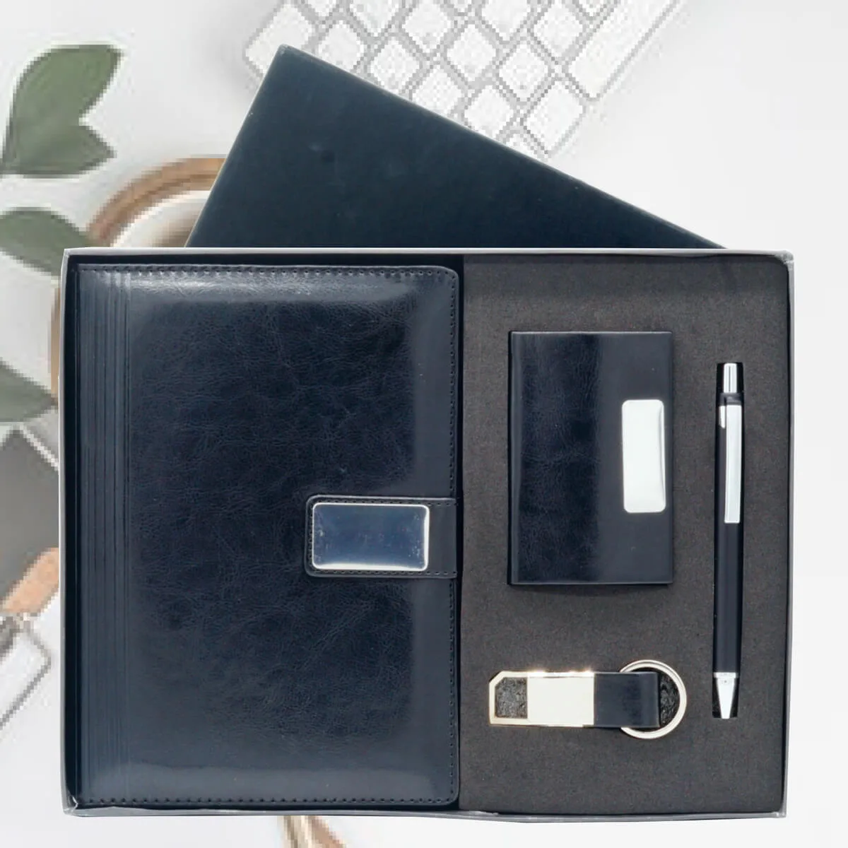 Gift Set Combo 4 in 1 5 Gift Set Combo 4 in 1 Black color with logo engraved on all Dairy, pen, Keychain, and Card Holder