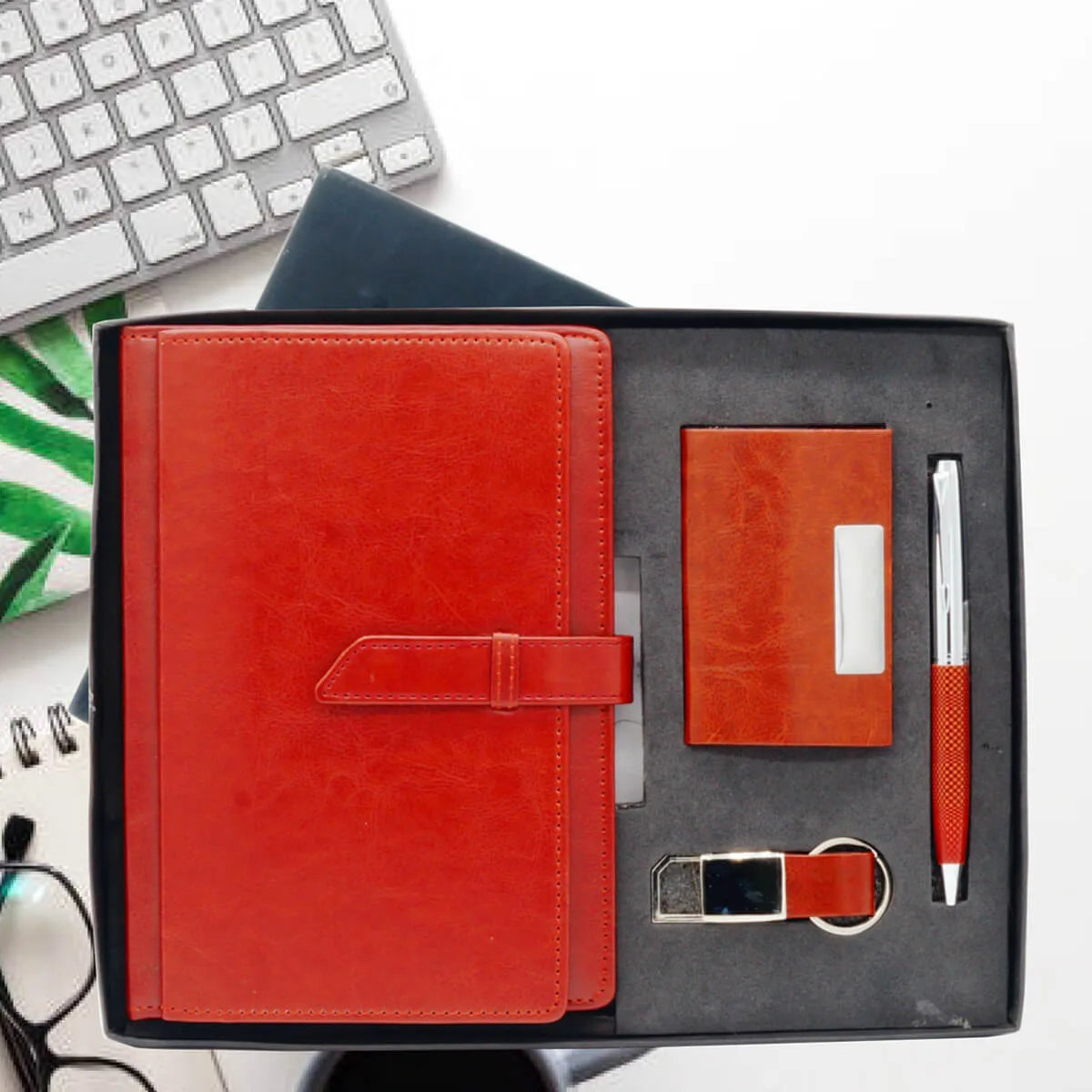 Gift Set Combo 4 in 1 3 Gift Set Combo 4 in 1 Brown color with logo engraved on all Dairy, pen, Keychain, and Card Holder