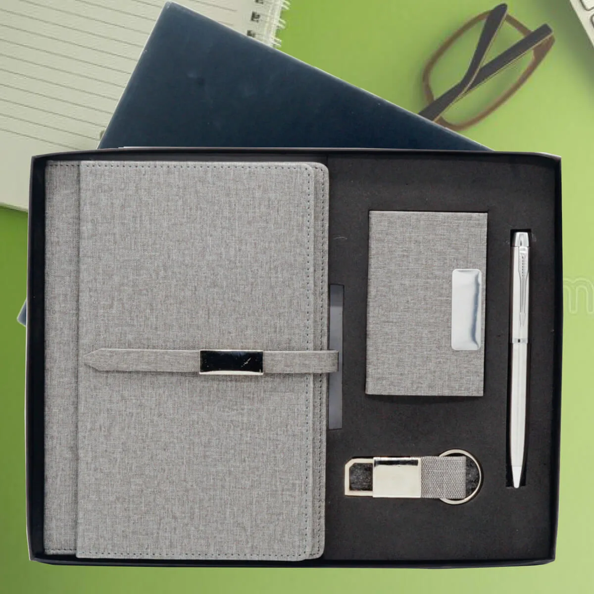 Gift Set Combo 4 in 1 2 Gift Set Combo 4 in 1 Grey color with logo engraved on all Dairy, pen, Keychain, and Card Holder